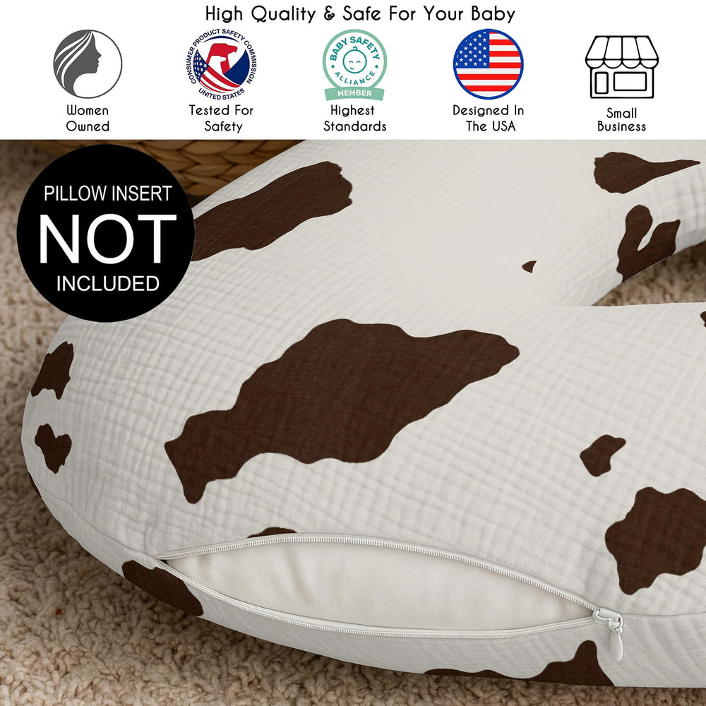 Sweet Jojo Designs muslin nursing pillow cover folded to show soft fabric texture.