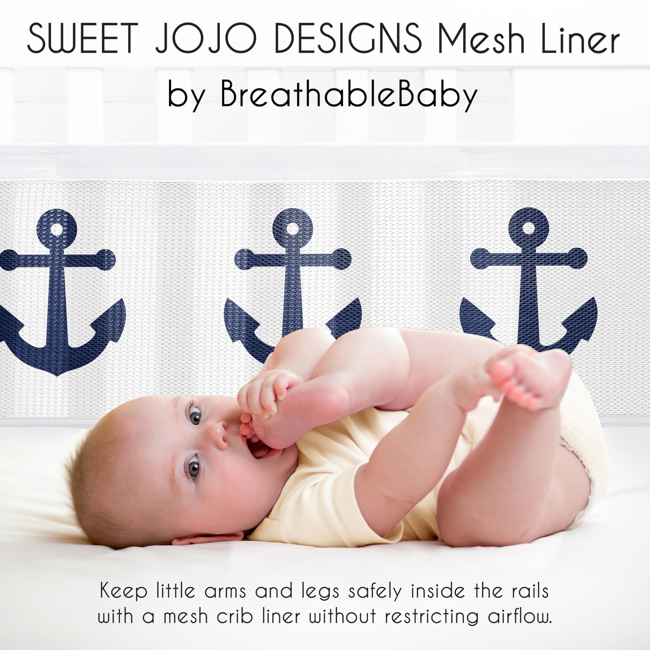 Sweet Jojo Designs nautical anchors print mesh, coordinates with navy bedding for a cohesive nursery.