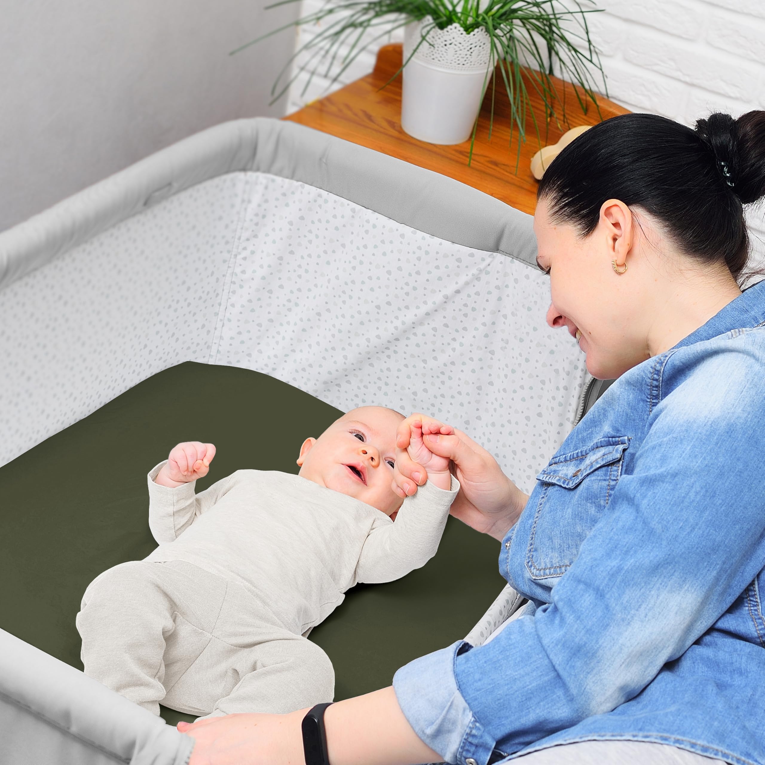 Sweet Jojo bassinet sheet set in forest theme enhances nursery decor