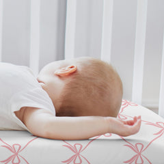 Sweet Jojo Designs 2-piece set with blush and white bows enhances nursery decor