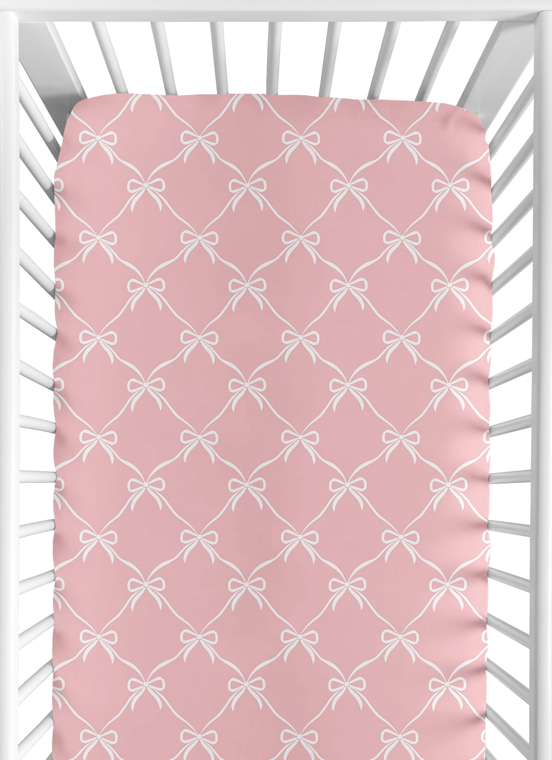 Sweet Jojo Designs pink bows crib sheet closeup, soft brushed microfiber for gentle baby sleep.
