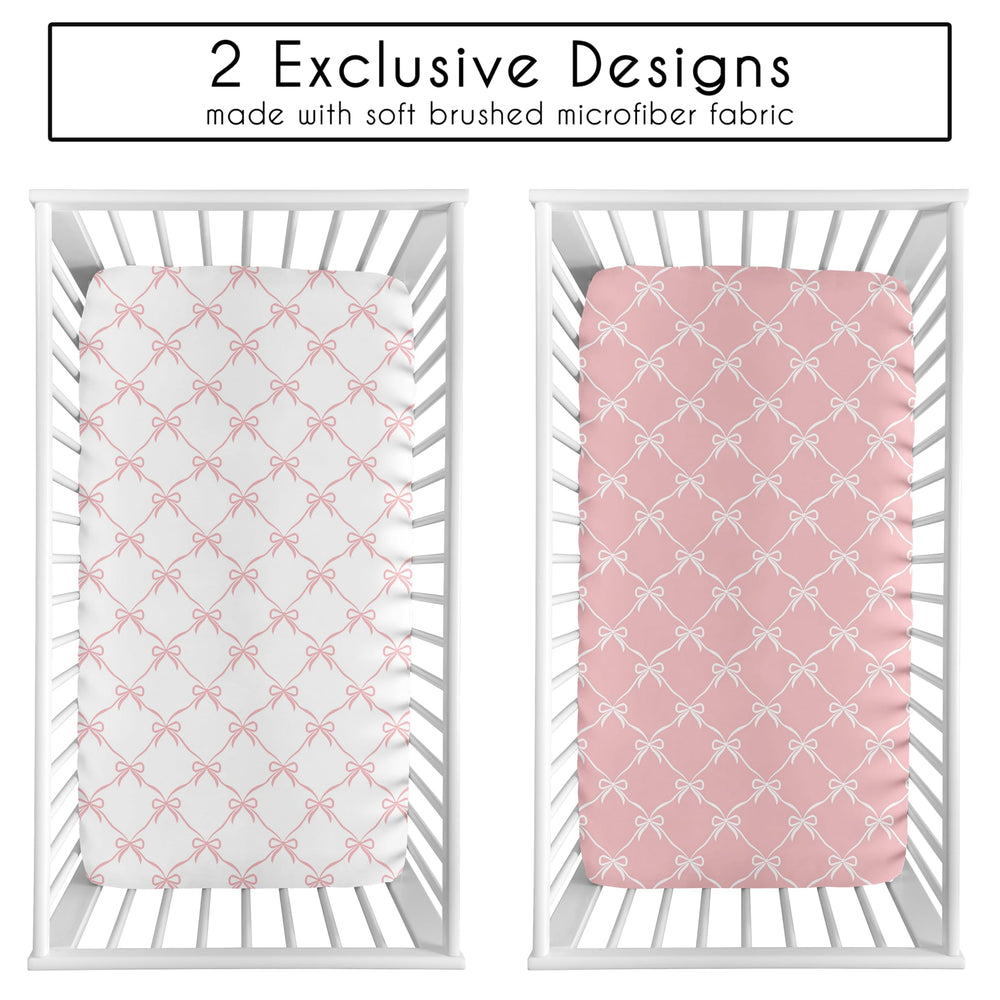 Sweet Jojo Designs pink and white bows pattern on sheets for a coordinated nursery look.