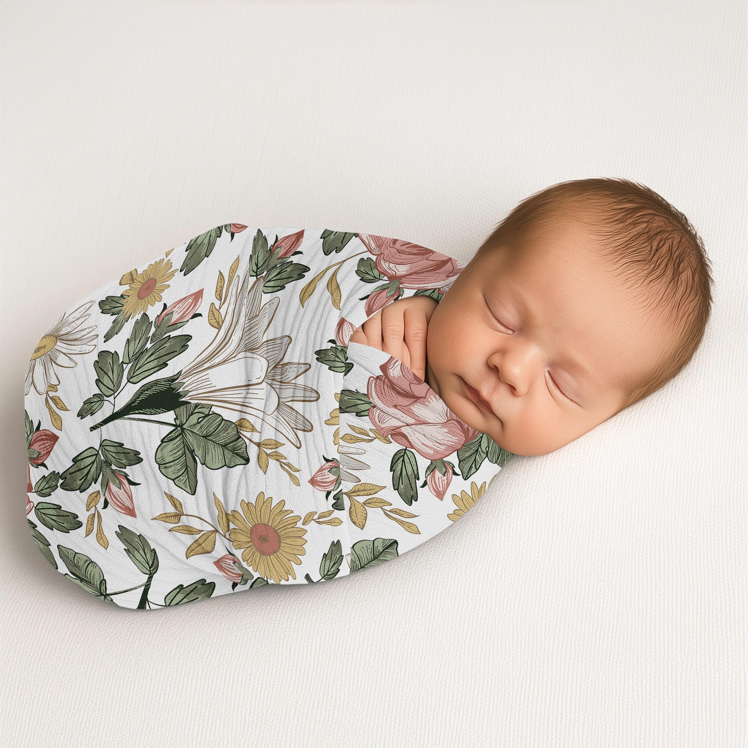 Roses and daisies in boho floral pattern on the Sweet Jojo swaddle for nursery decor.