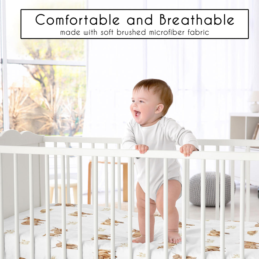 Sweet Jojo Designs snug-fit crib sheet with elastic edge for secure mattress stay.