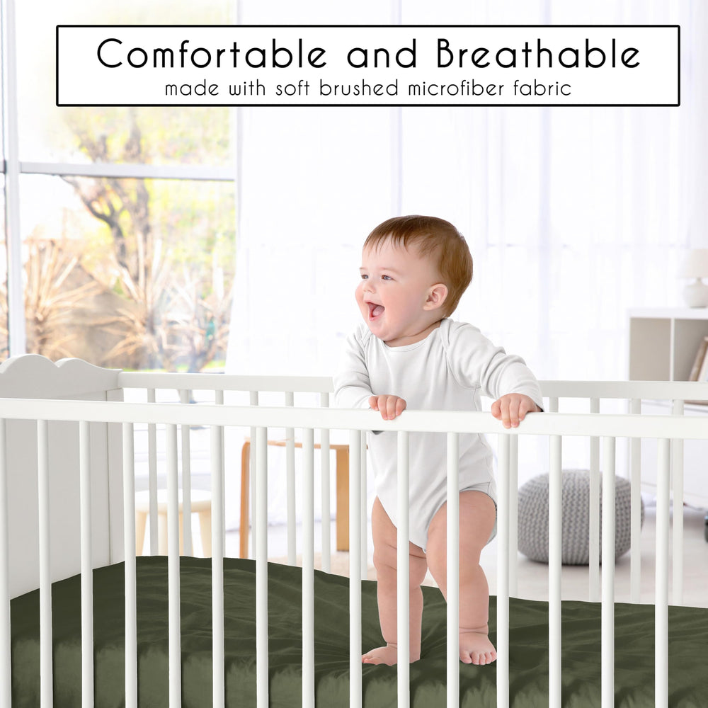 Sweet Jojo Designs snug-fit elastic-hem crib sheet for secure crib coverage.