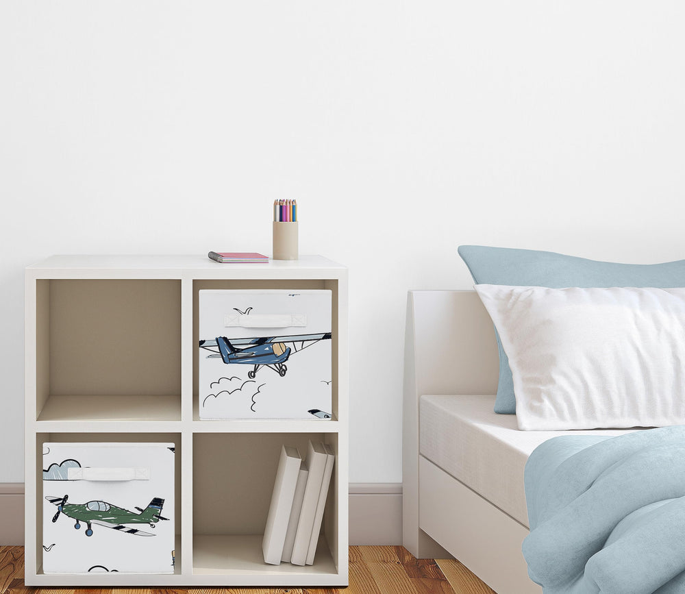 Sweet Jojo Designs storage cubes with reinforced fabric handles for easy sliding from shelves.
