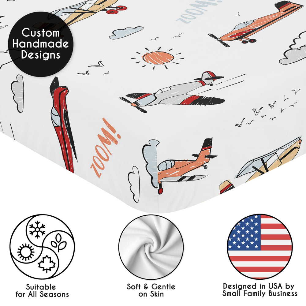 Sweet Jojo Designs sun motif crib sheet introduces bright color accents.