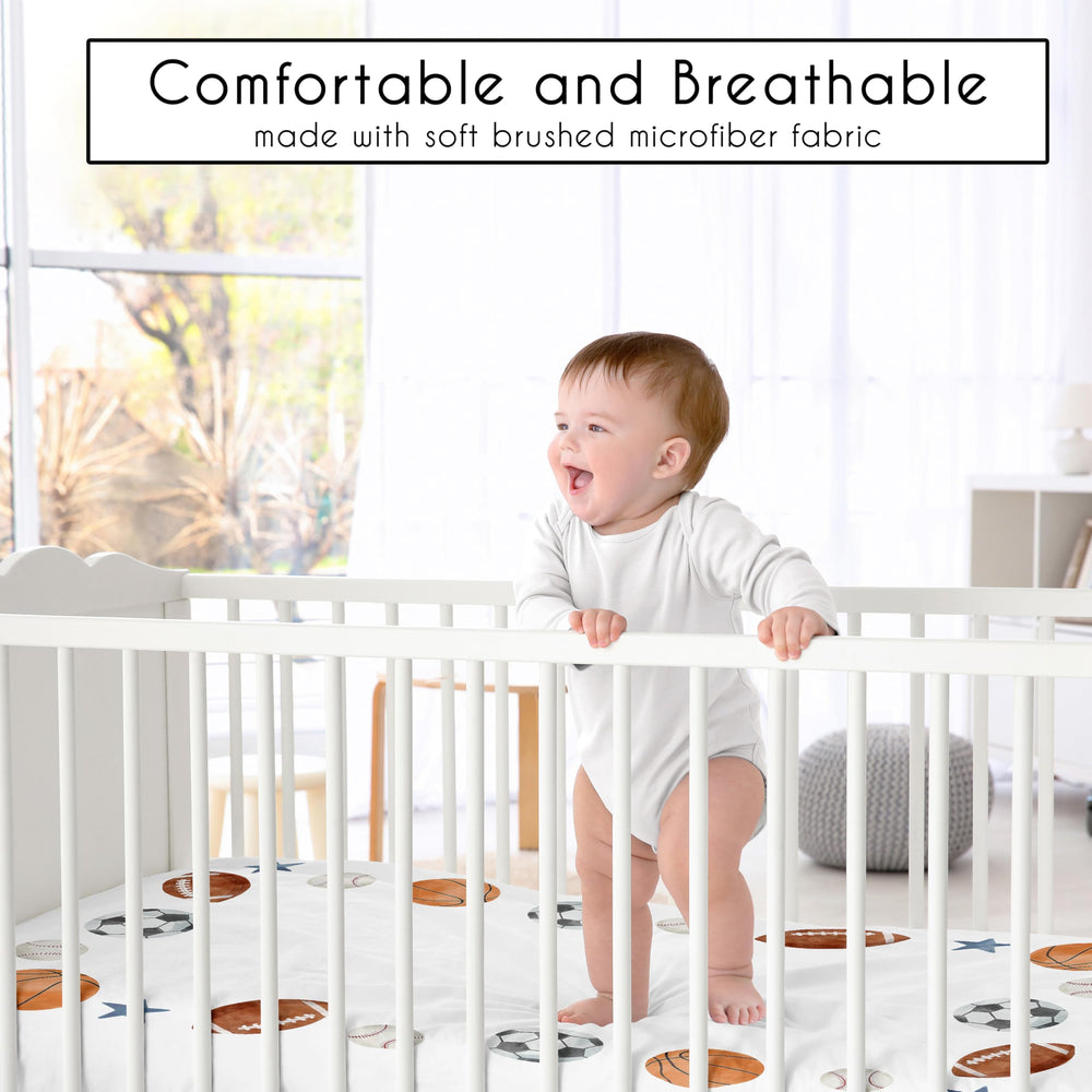 Sweet Jojo Designs vintage sports crib sheet on crib illustrating secure fit