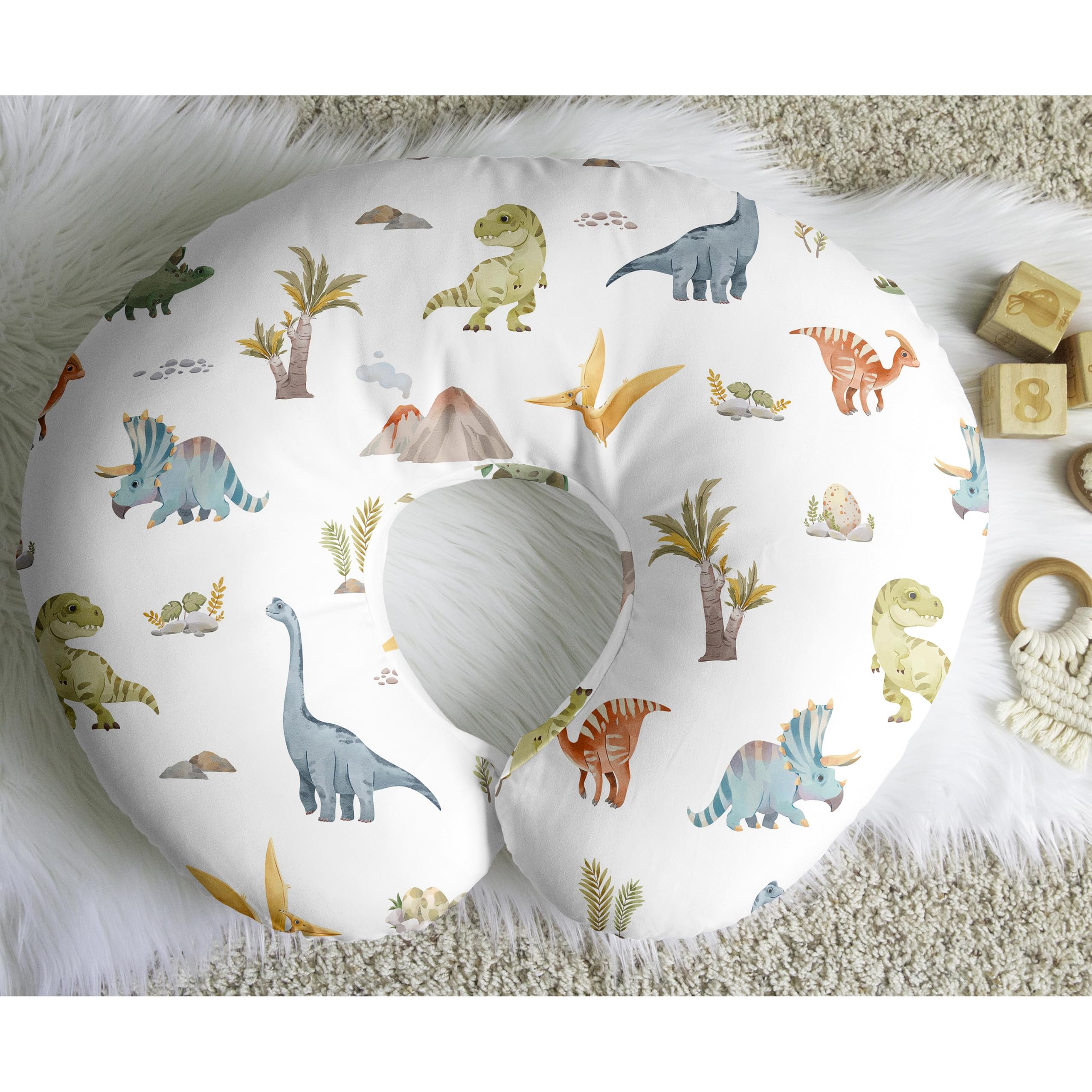 Bright dinosaur print enhances nursery decor by Sweet Jojo Designs