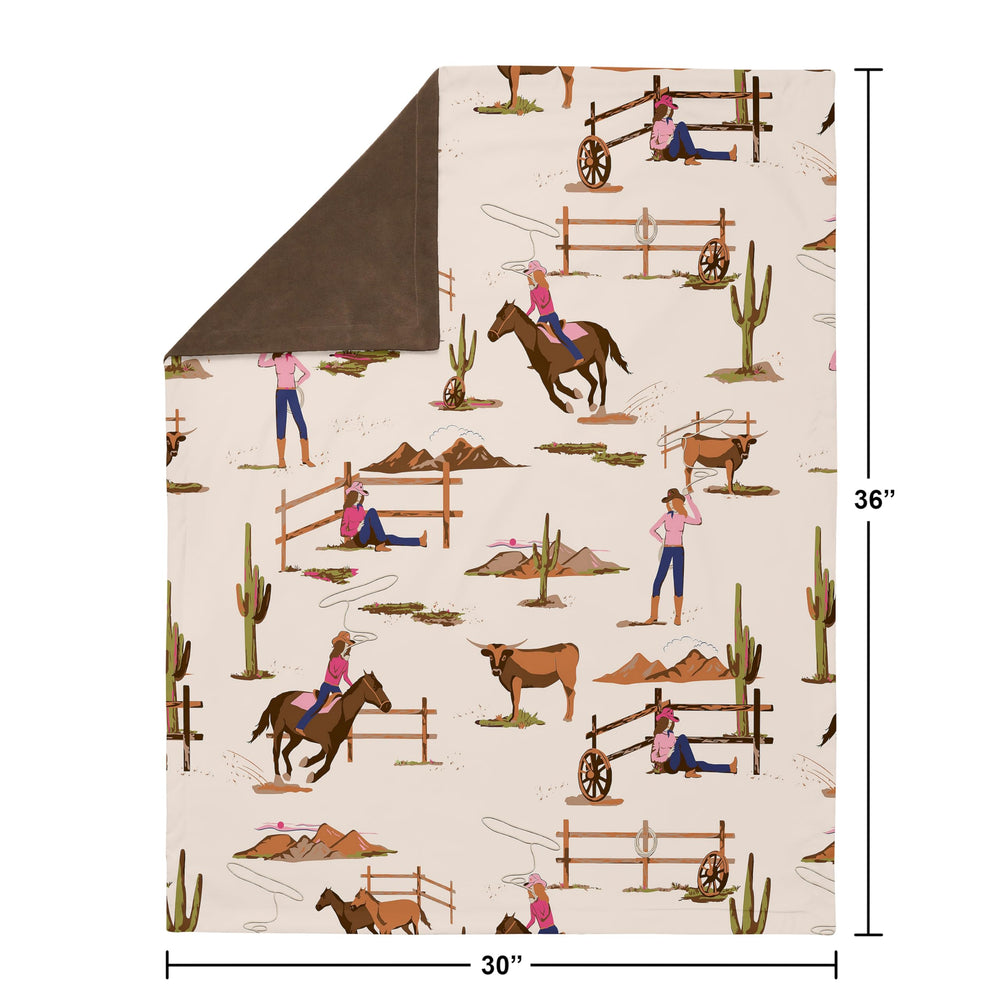 Sweet Jojo Designs western cowgirl blanket coordinates with nursery decor for cohesive styling.