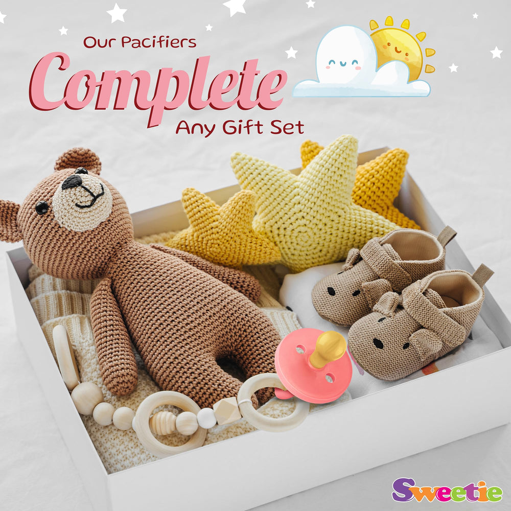 Sweetie pink pacifier shown conforming to EN1400 standard.