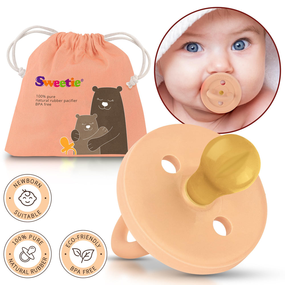 Sweetie natural rubber pacifier on soft surface illustrating ergonomic design.
