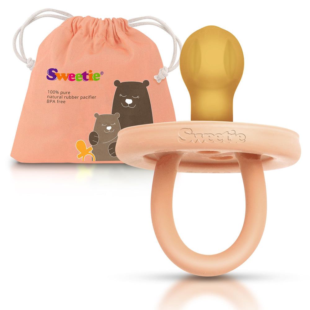Sweetie pacifier natural rubber close-up showing soft, natural material for baby comfort.