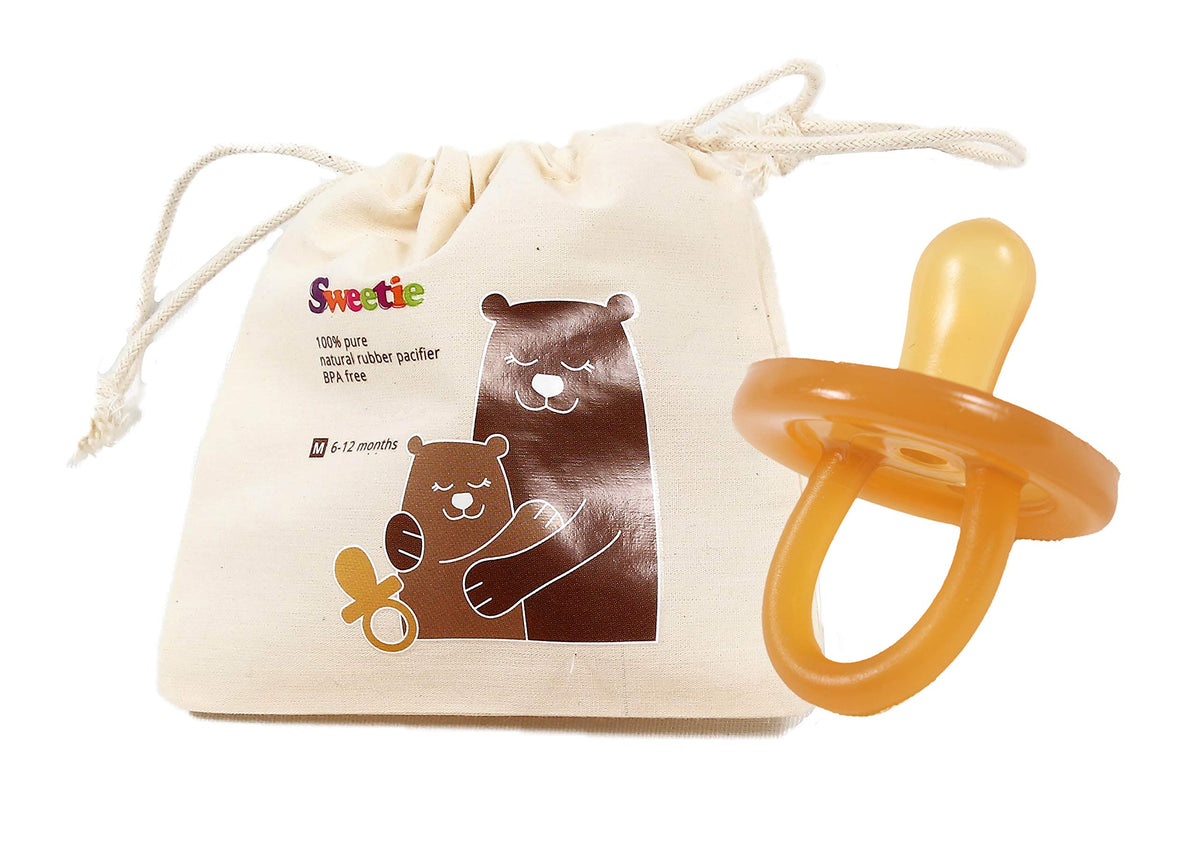 Sweetie rubber pacifier close-up shows natural rubber material for gentle soothing.