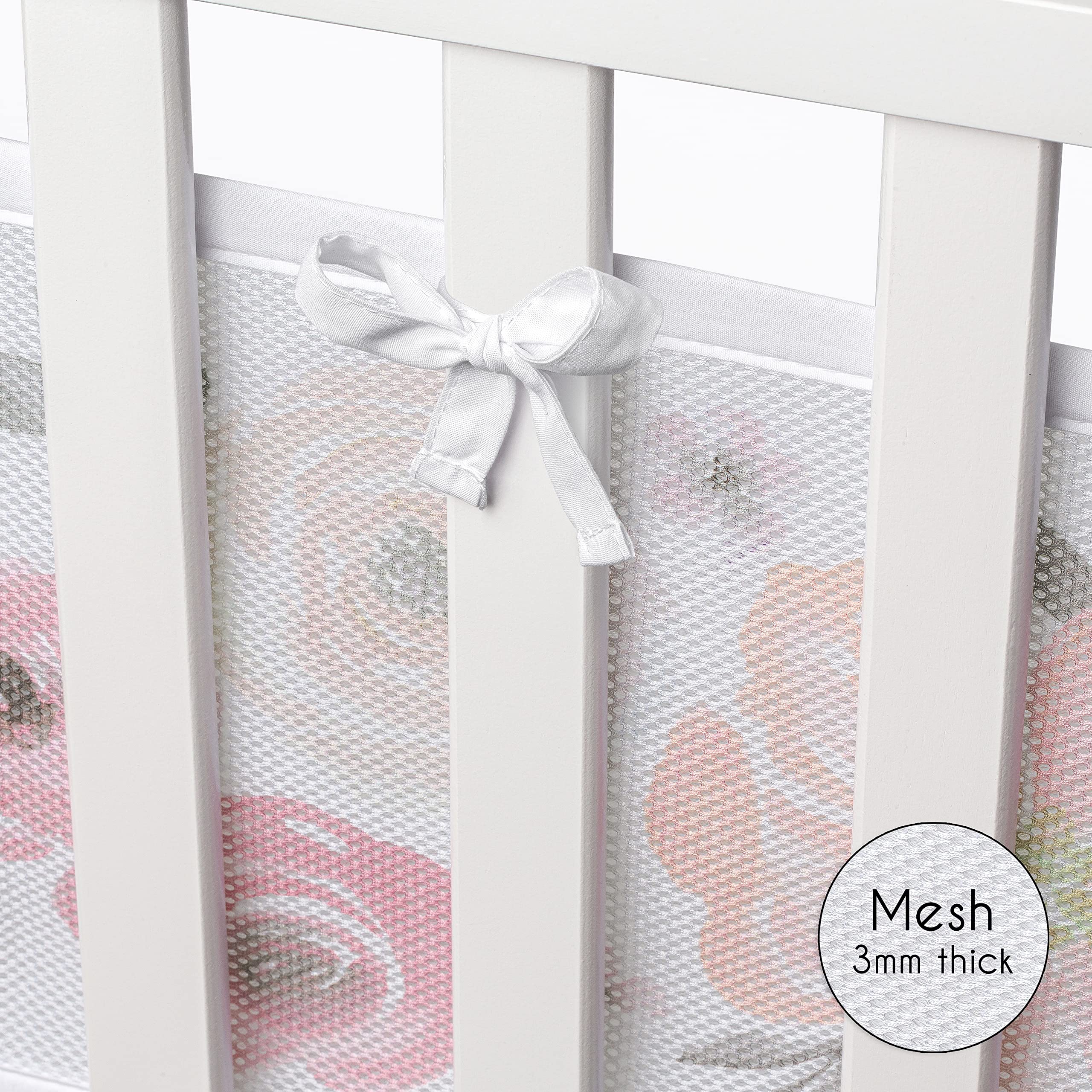 Sweet Jojo pink-grey boho theme enhances nursery decor.