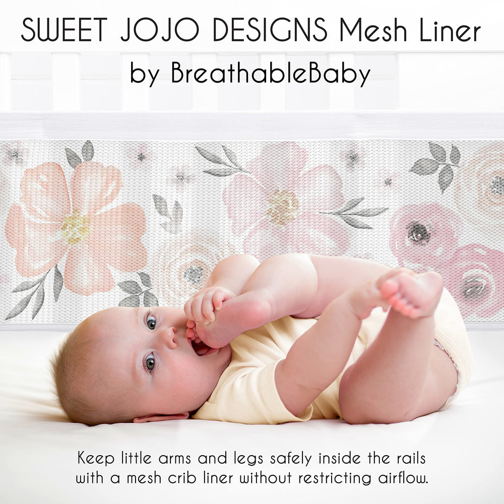 Sweet Jojo watercolor floral print crib liner enhances nursery style.