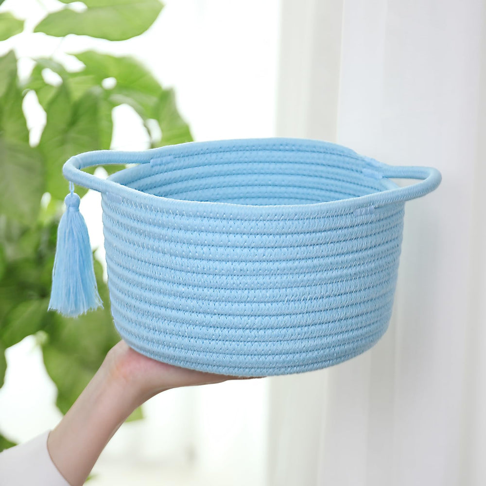 SweetMemo sky-blue mini basket tassel detail highlights decorative charm and craft quality.