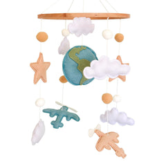 Sweety Baby airplane mobile with globe, clouds, and stars promotes visual tracking in a calm nursery