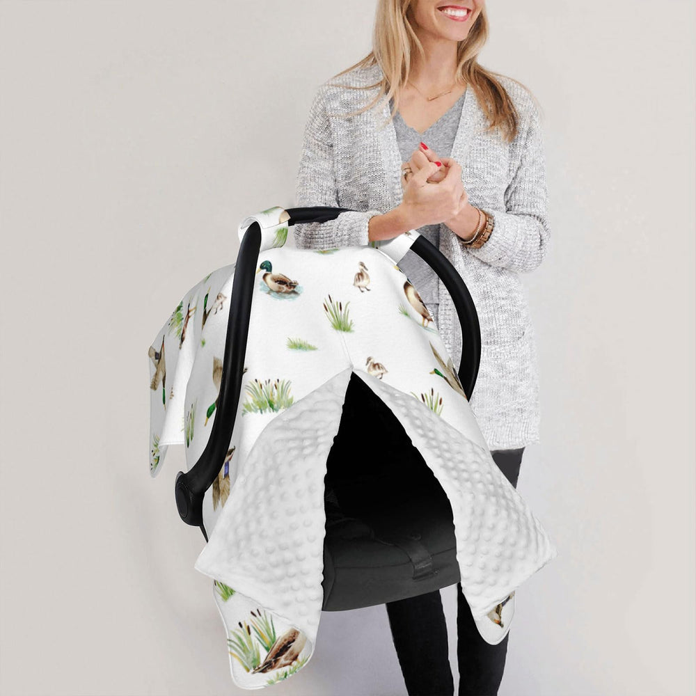 Sweety Baby multi-use cover doubles as nursing cover and blanket.