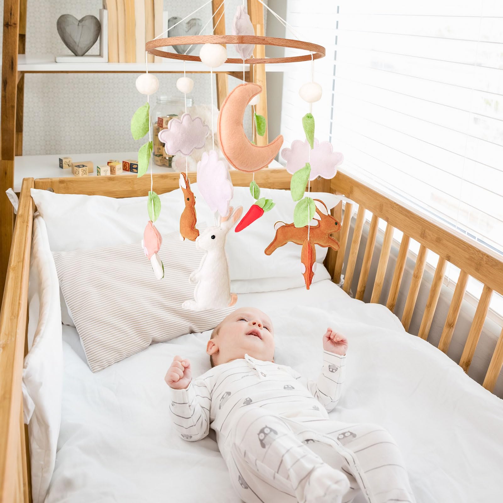 Sweety Baby pack and play mobile woodlands for versatile use.