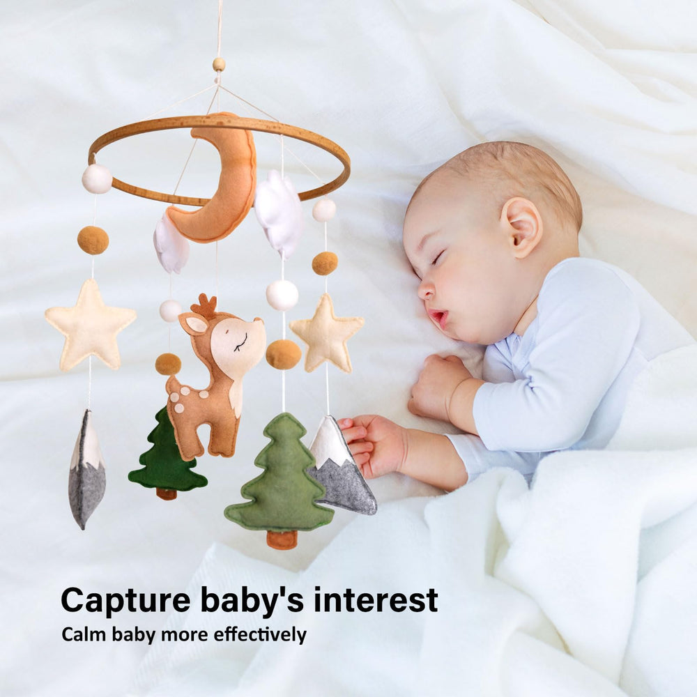 Sweety Baby Woodland Mobile clouds add dreamy scenery above the crib.
