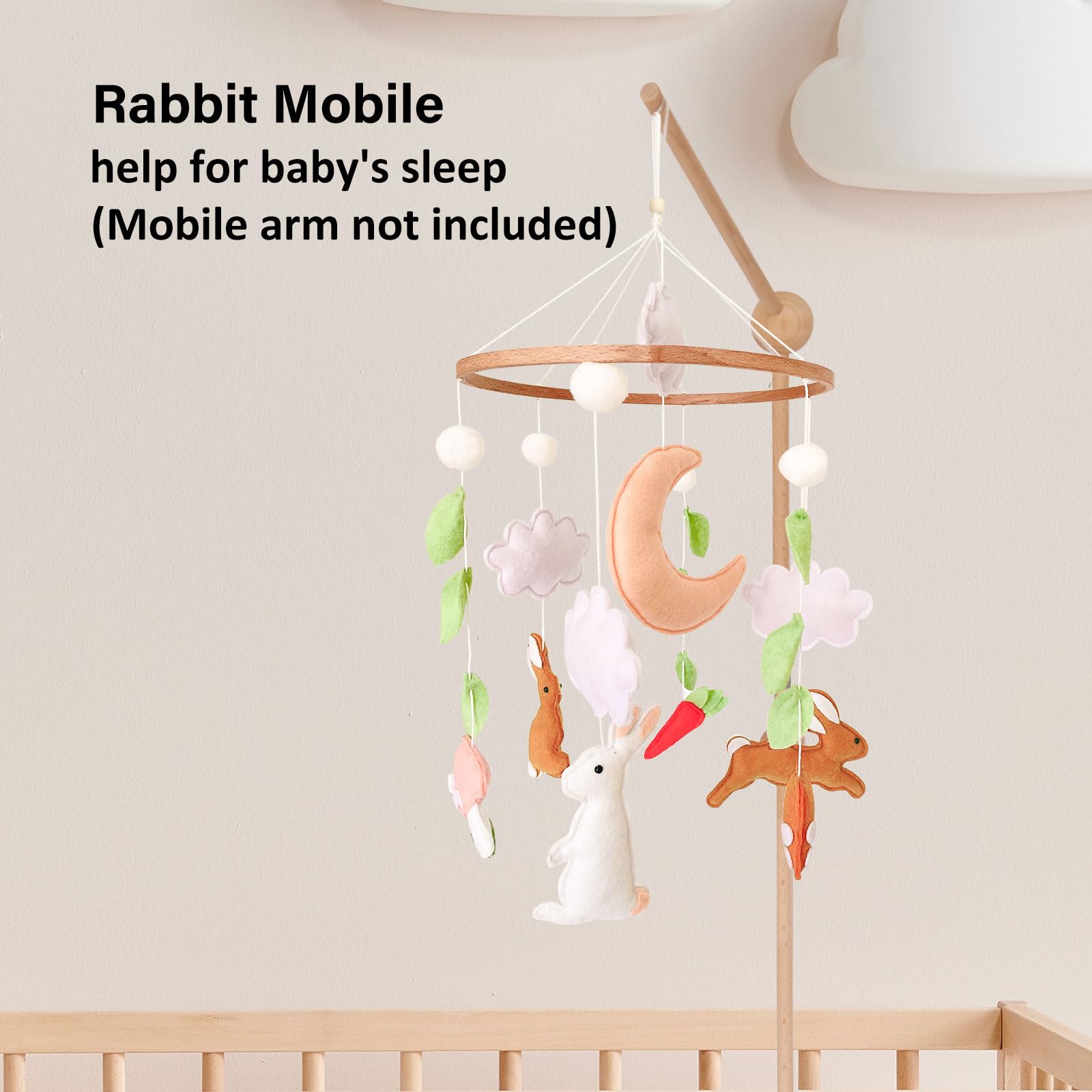 Sweety Baby rabbit nursery decor features soft felt animals for gentle visual interest.