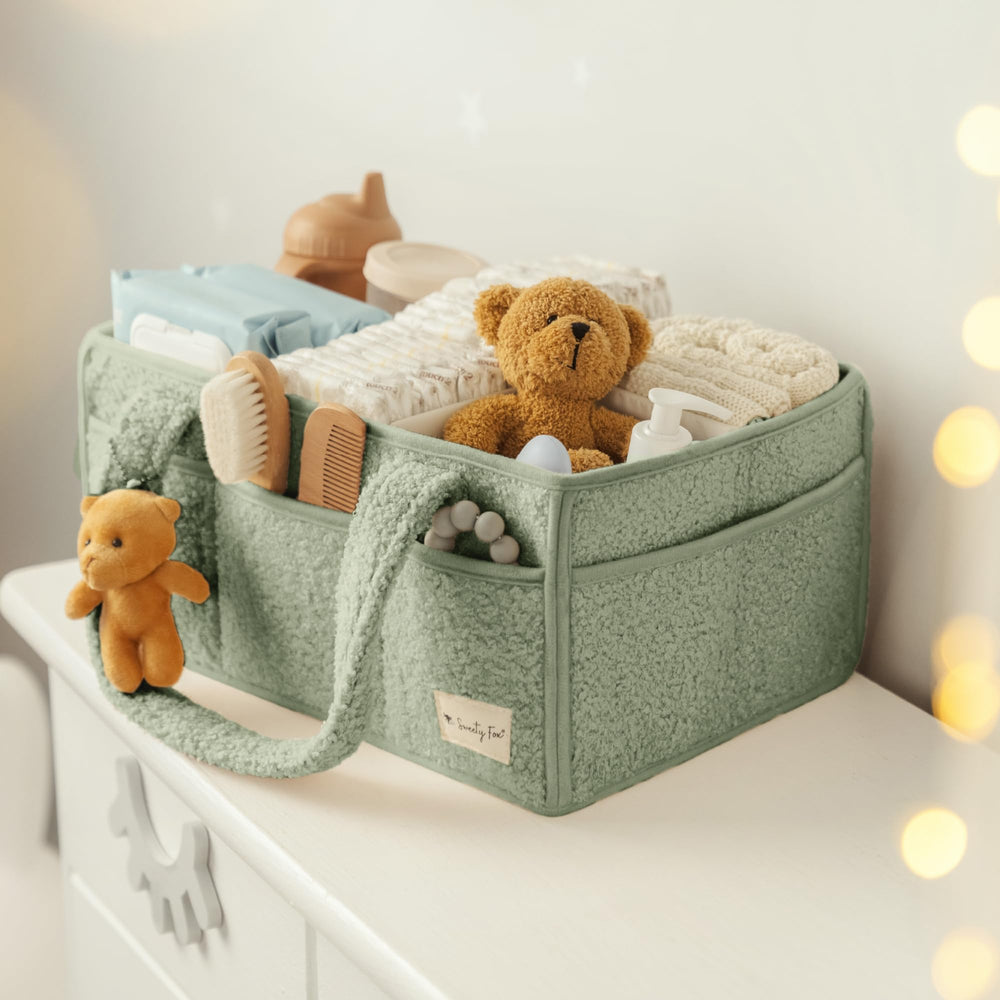 Sweety Fox portable nursery storage in use beside changing table.