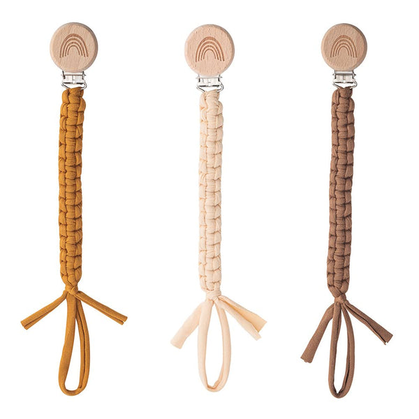 Symbolife pacifier clip close-up showing wooden teeth grip.