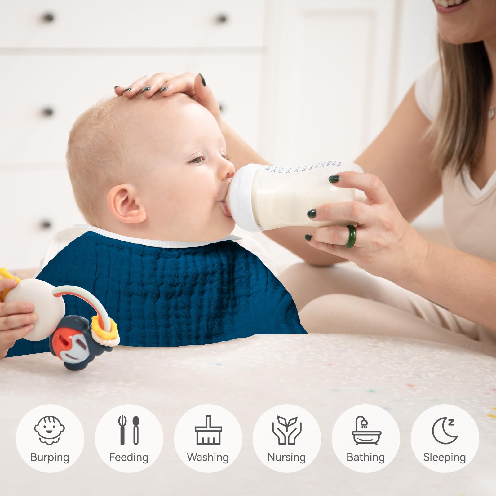 Synrroe burp cloths being used for baby cleaning and diapering tasks