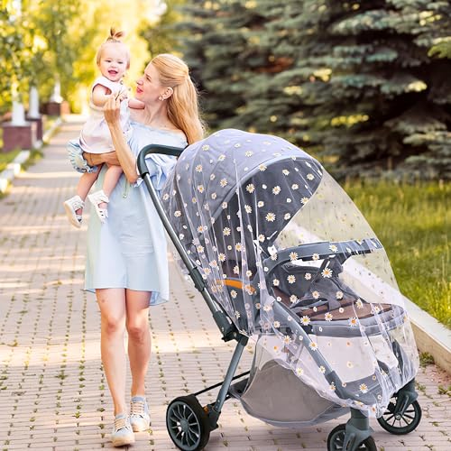 Sysmie stroller mosquito net in daisy colorway keeps baby comfortable outdoors.