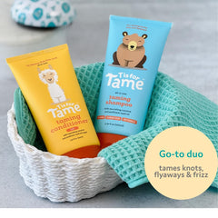 T is for Tame Taming Conditioner curls bottle highlights detangling and smooth hair care for curls.