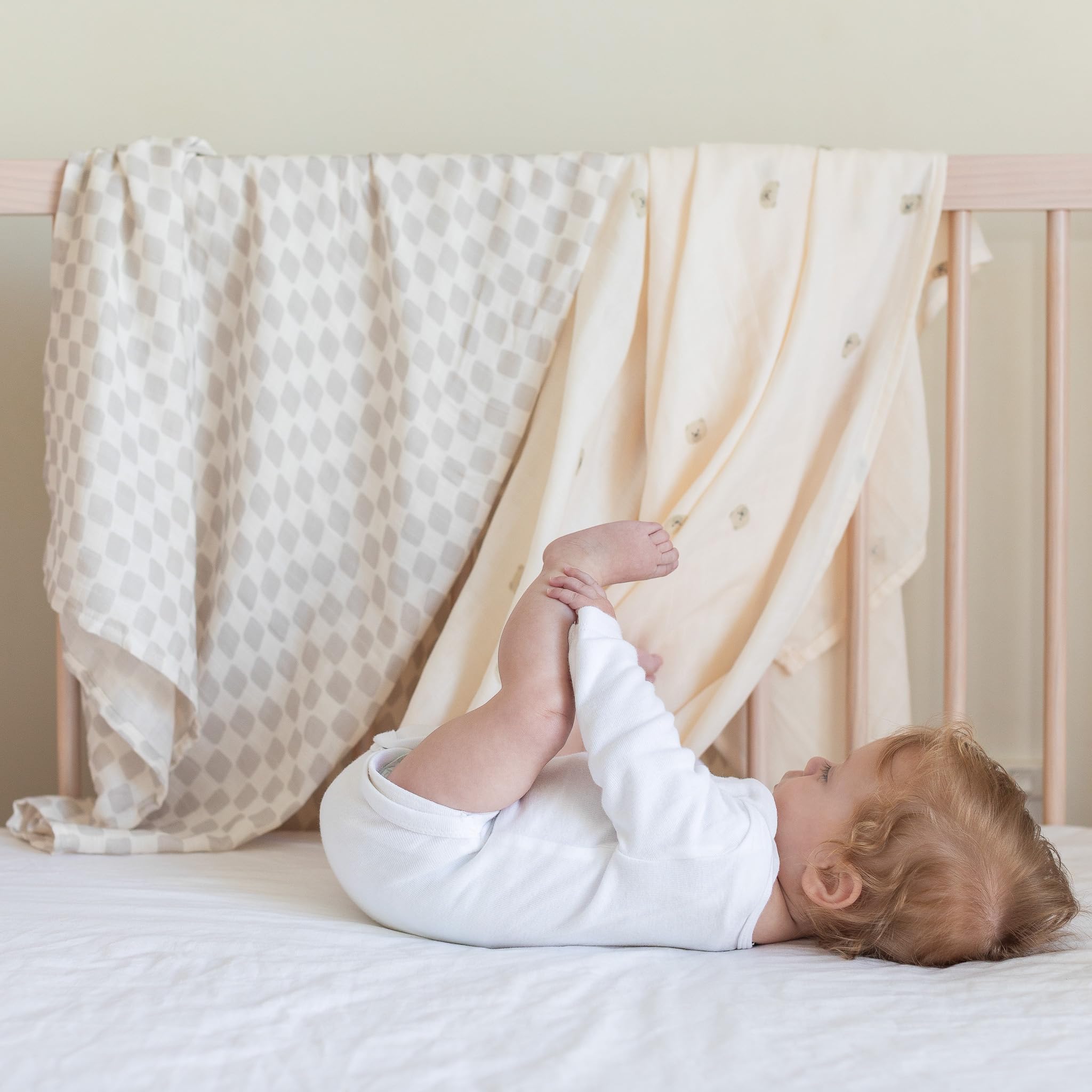 TAB Muslin Swaddle Blanket baby swaddled gently for secure newborn comfort.