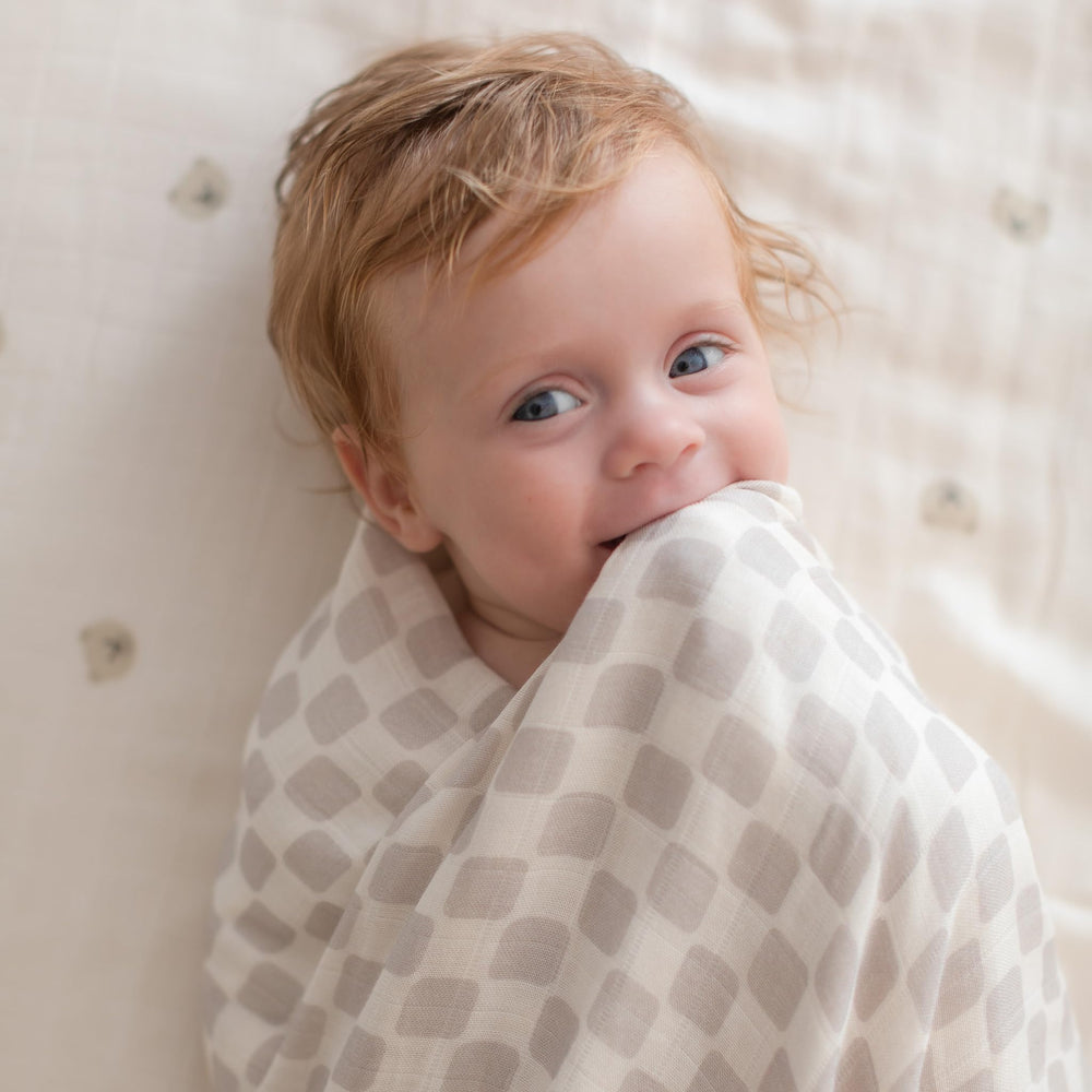 TAB Muslin Swaddle Blanket large size provides ample coverage 47x47 inches.