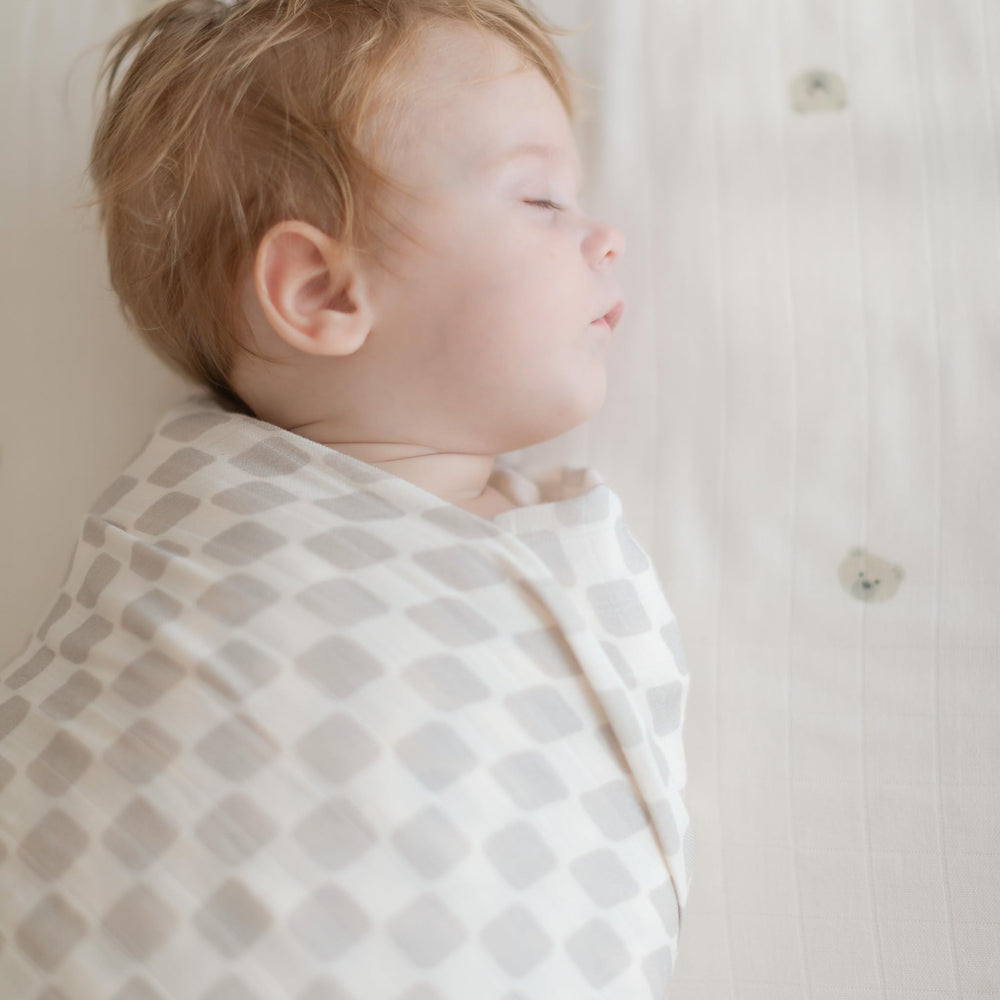 TAB Muslin Swaddle Blanket used as nursing cover during feeding sessions.