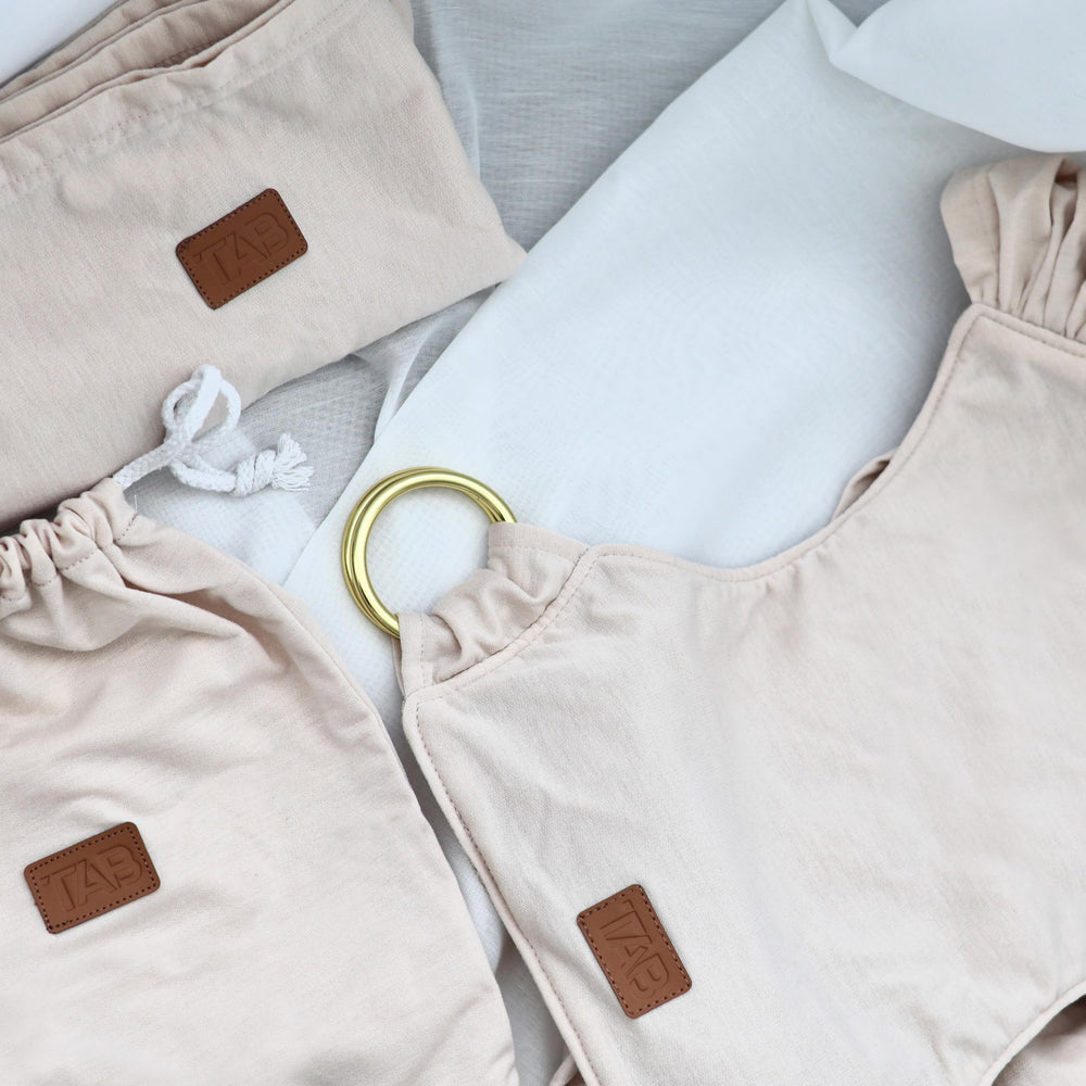 TAB versatile carrying options including front-facing and inward hug