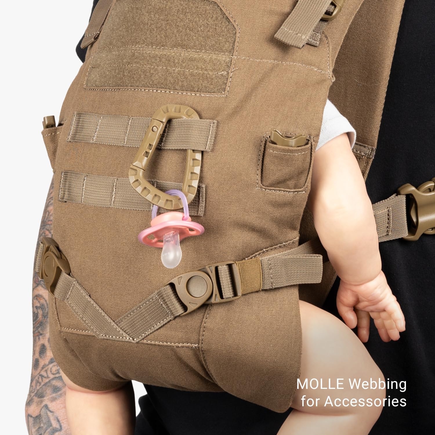 Baby facing-in position illustrates hip-friendly support.
