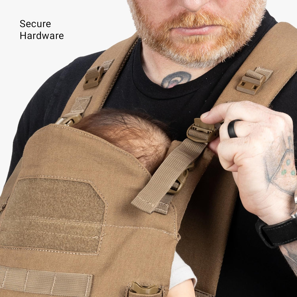 Machine-washable bib protects the carrier when baby faces out.