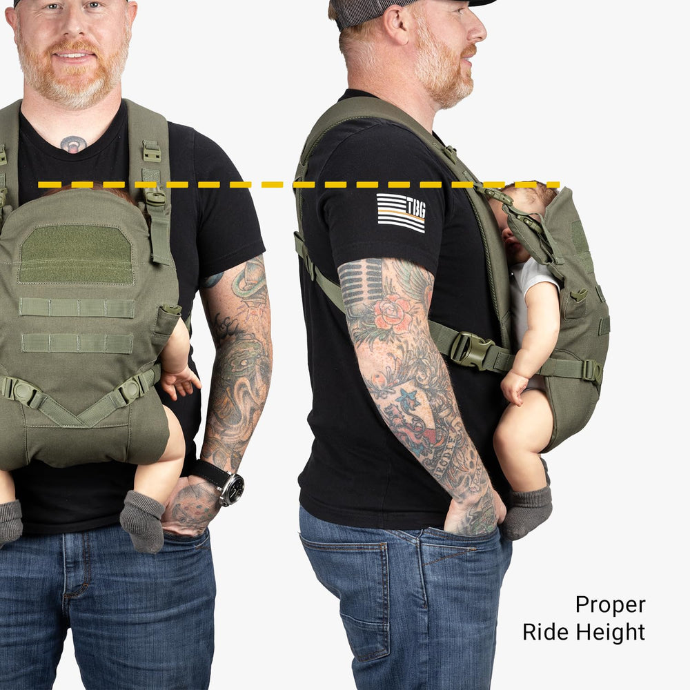 Tactical Baby Gear ranger-green carrier shown in rugged everyday use.