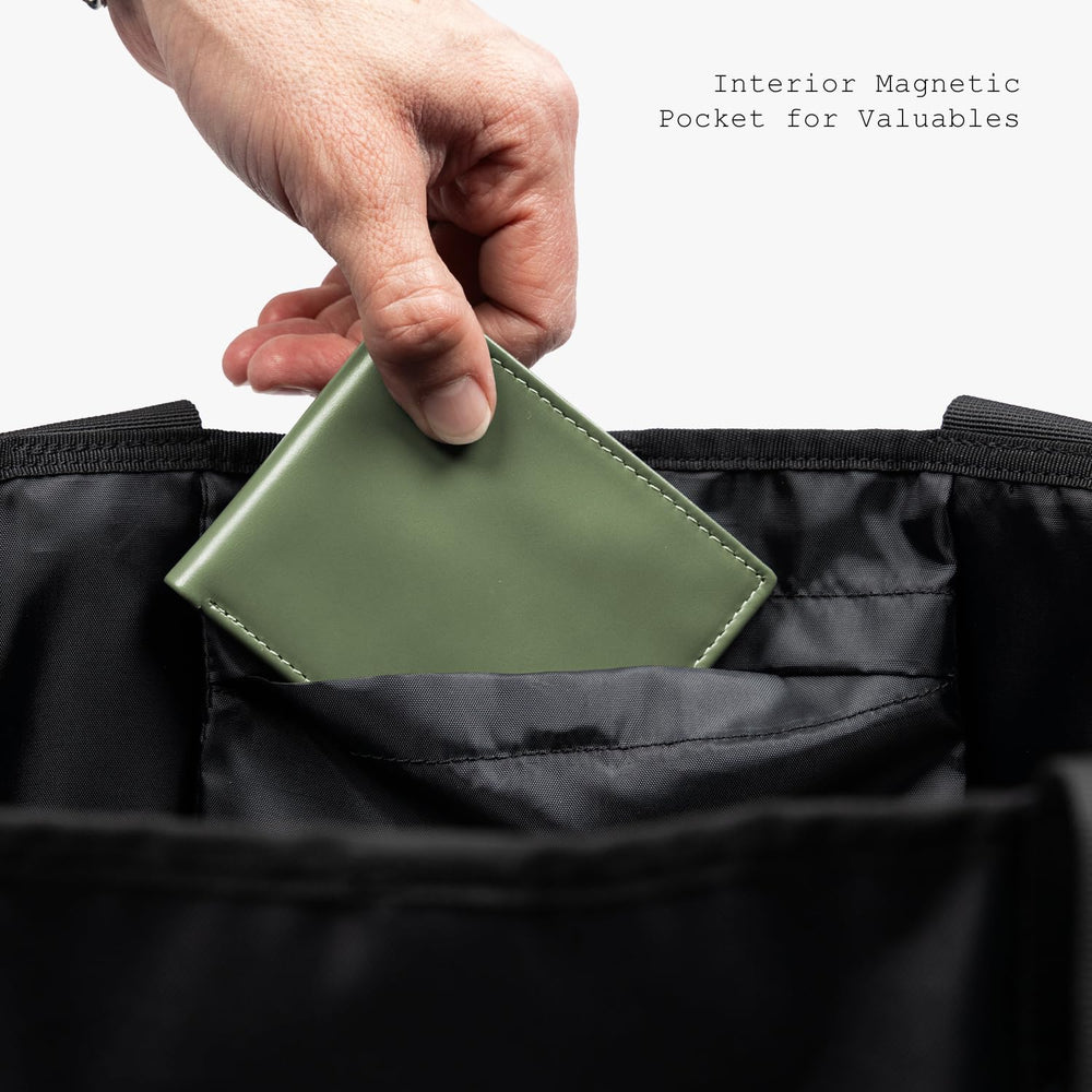 Tactical Tote Diaper Bag interior shown with mesh pockets for organization.