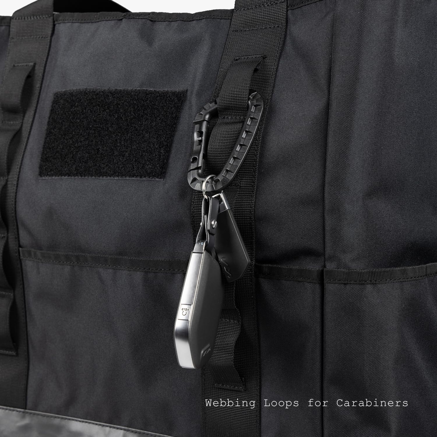 Tactical Tote Diaper Bag padded grab handle for comfortable carrying.