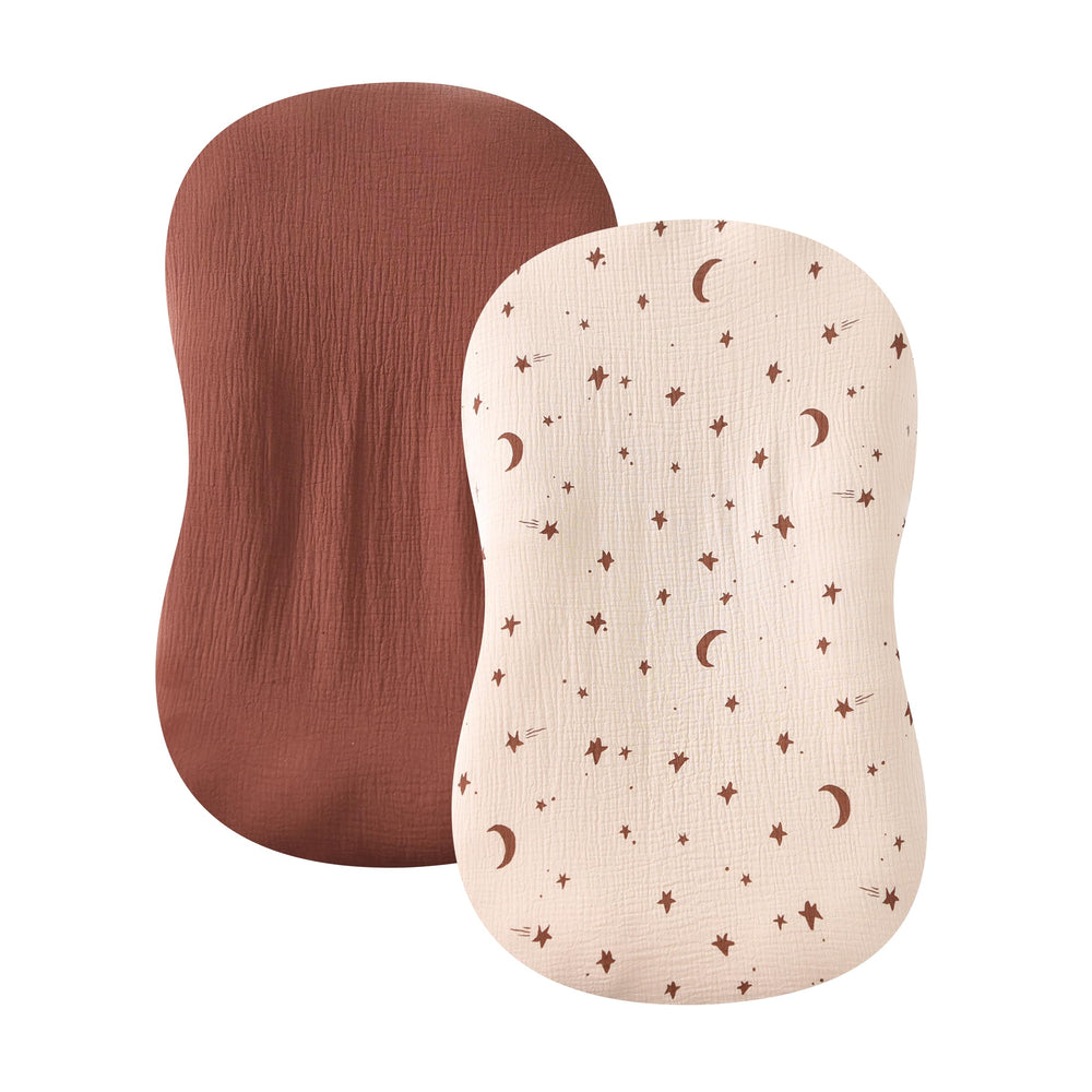 Tado Muslin cover in soft cream adds gentle touch against baby skin.
