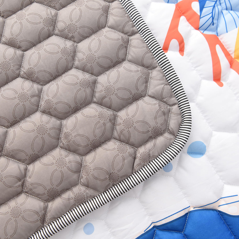 TADO MUSLIN foldable play mat makes a stylish nursery gift