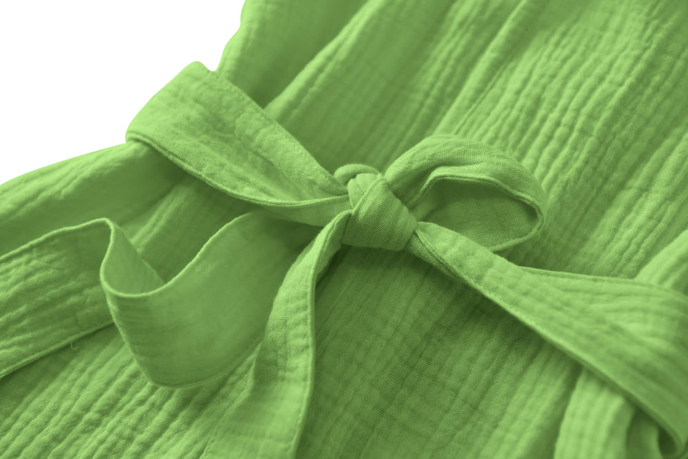 TADO MUSLIN size range tag and preshrunk fabric close-up