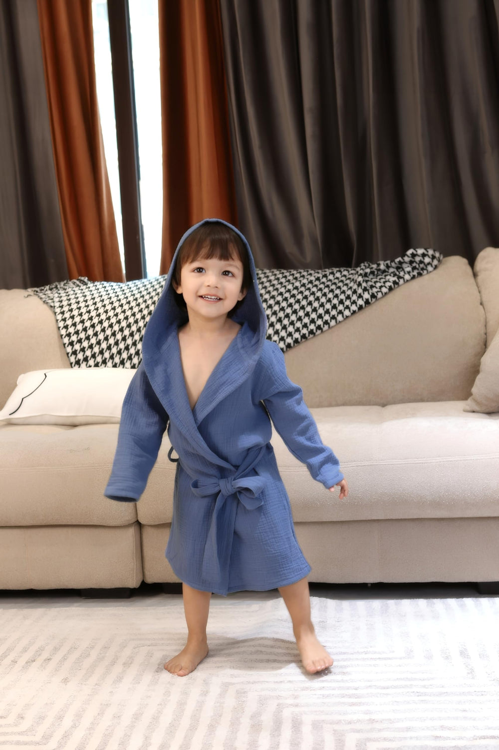 Tado Muslin hooded robe keeps little ones warm after baths.