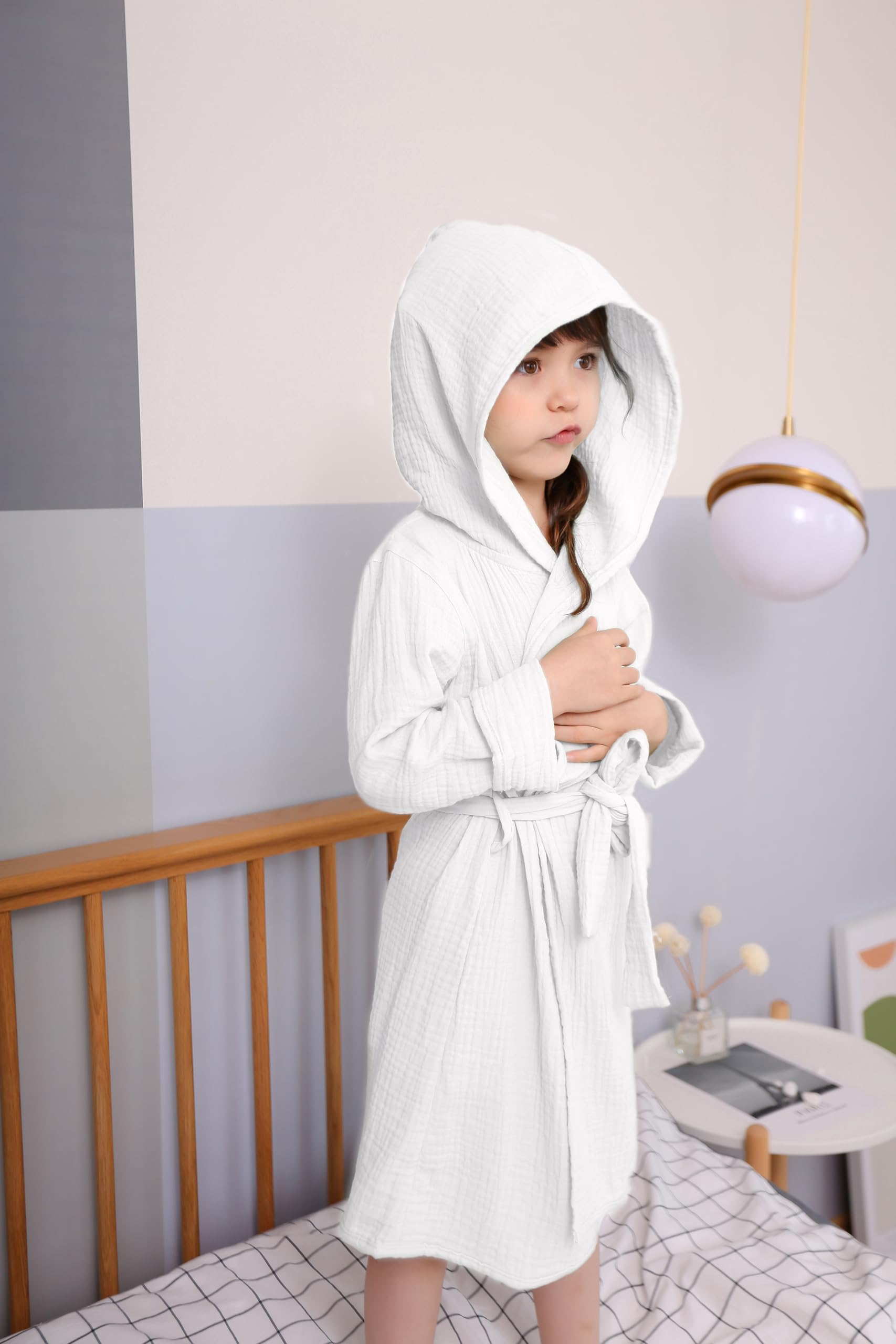TADO MUSLIN breathable hood adds cozy coverage for lounging after baths.