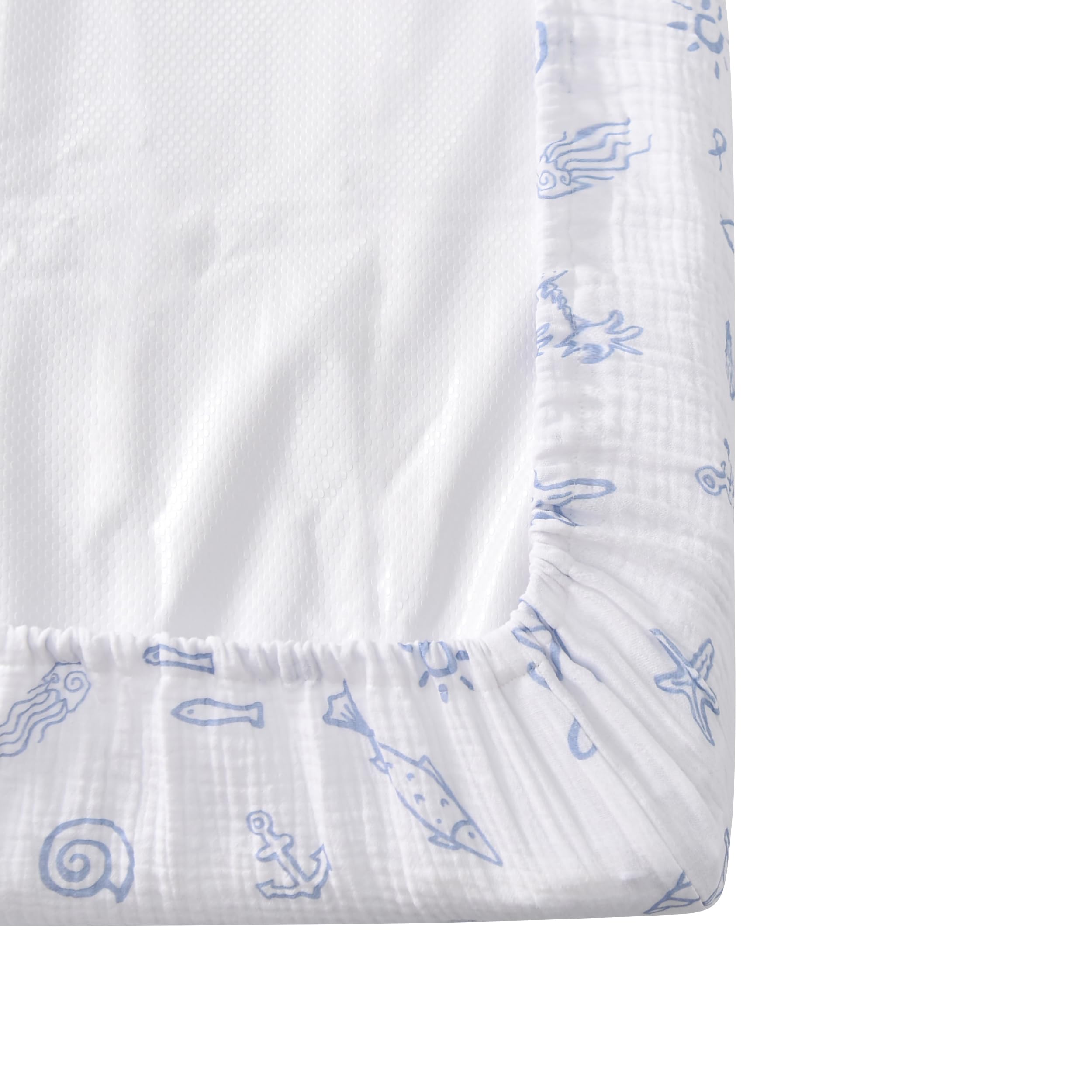 Soft, breathable muslin on TADO MUSLIN changing pad cover in nursery setting