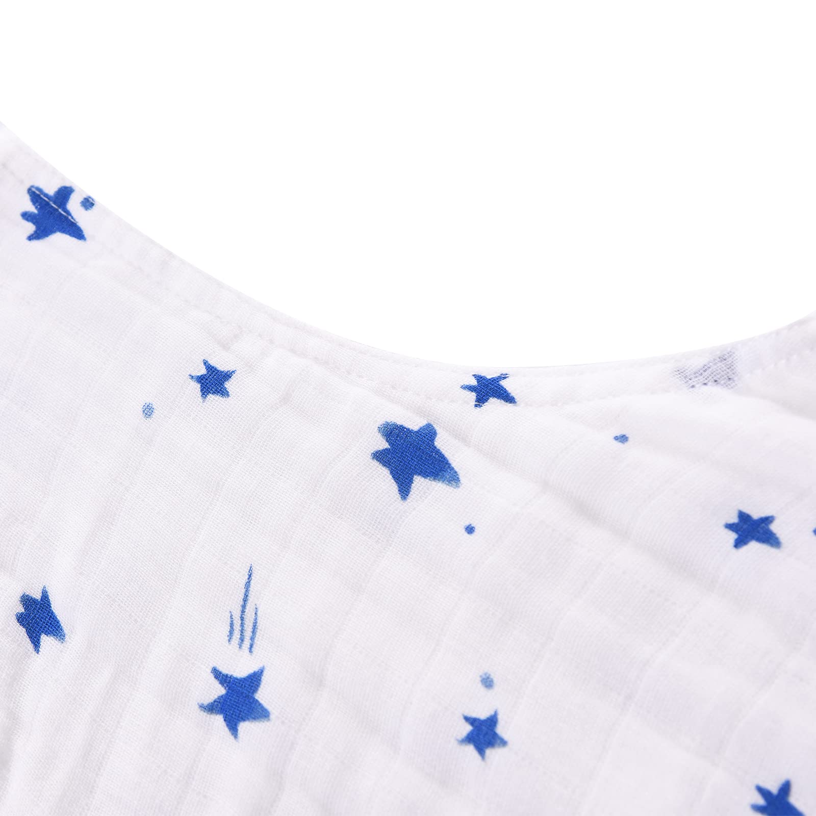 Toddler in crib wearing TADO MUSLIN sleep sack during a warm night