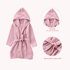 TADO MUSLIN hooded design close-up emphasizes cozy warmth.
