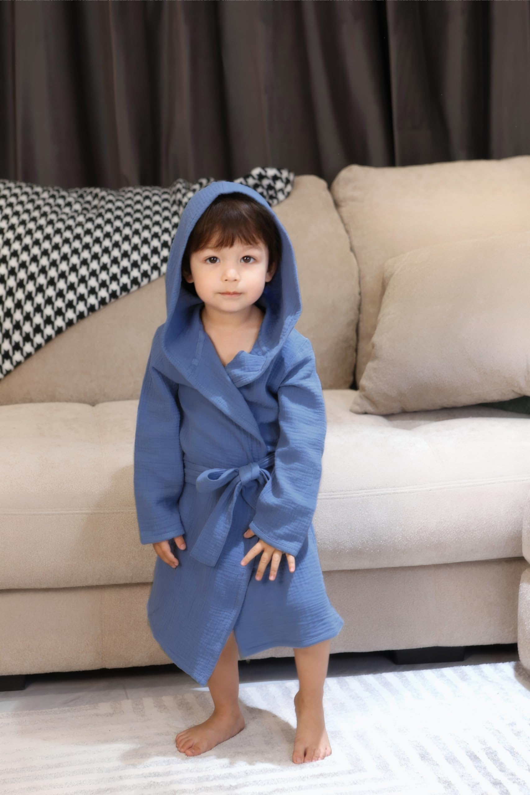 Tado Muslin organic cotton robe delivers soft, breathable comfort for babies.