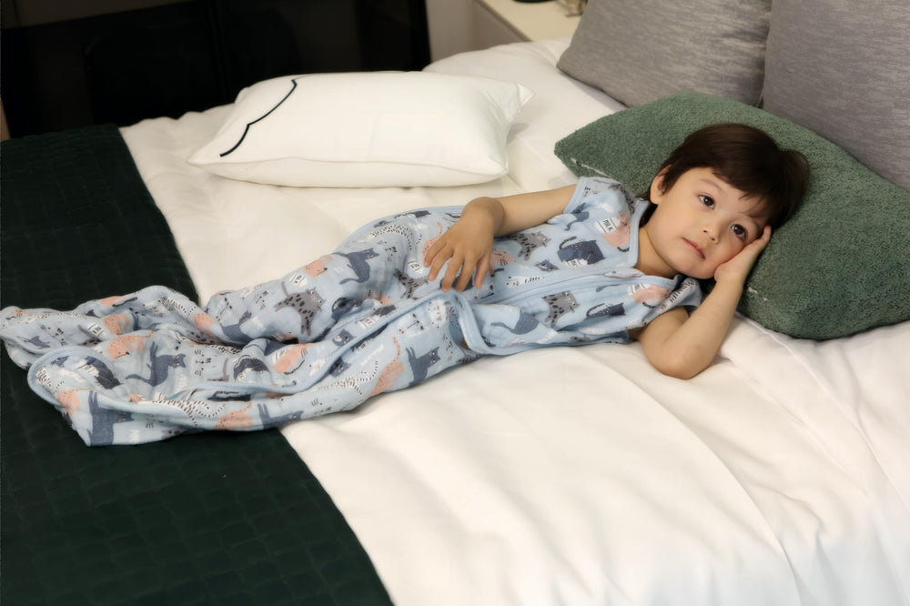 TADO MUSLIN organic cotton fabric close-up emphasizes breathable soft texture.